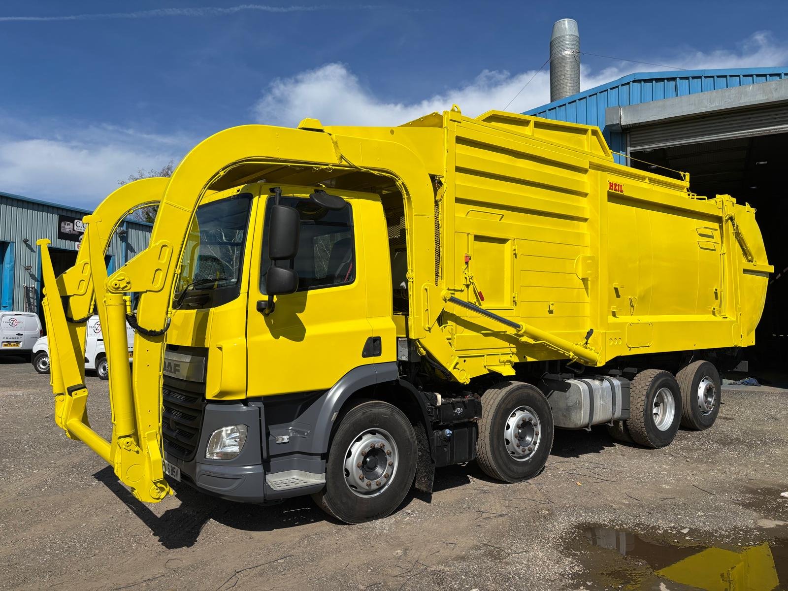 Yellow painted commercial vehicle