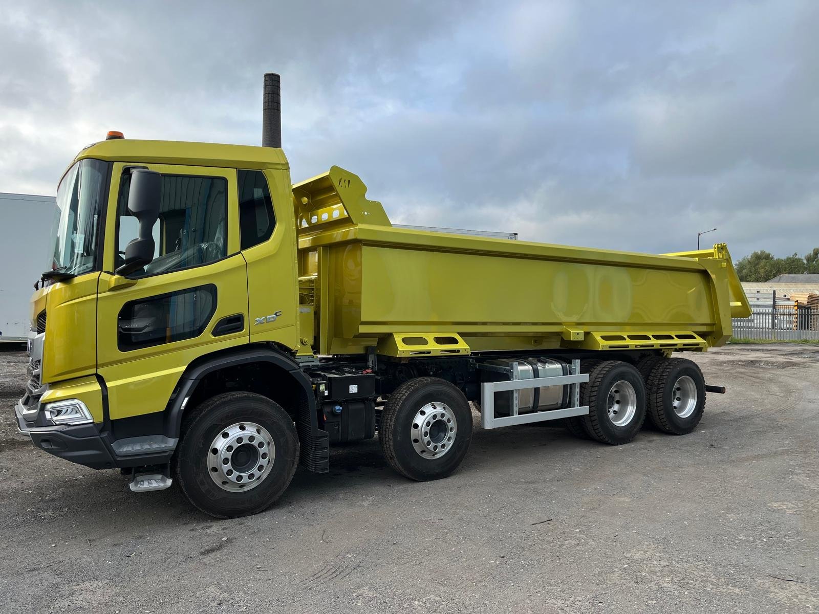 Painted commercial truck in yellow and grey