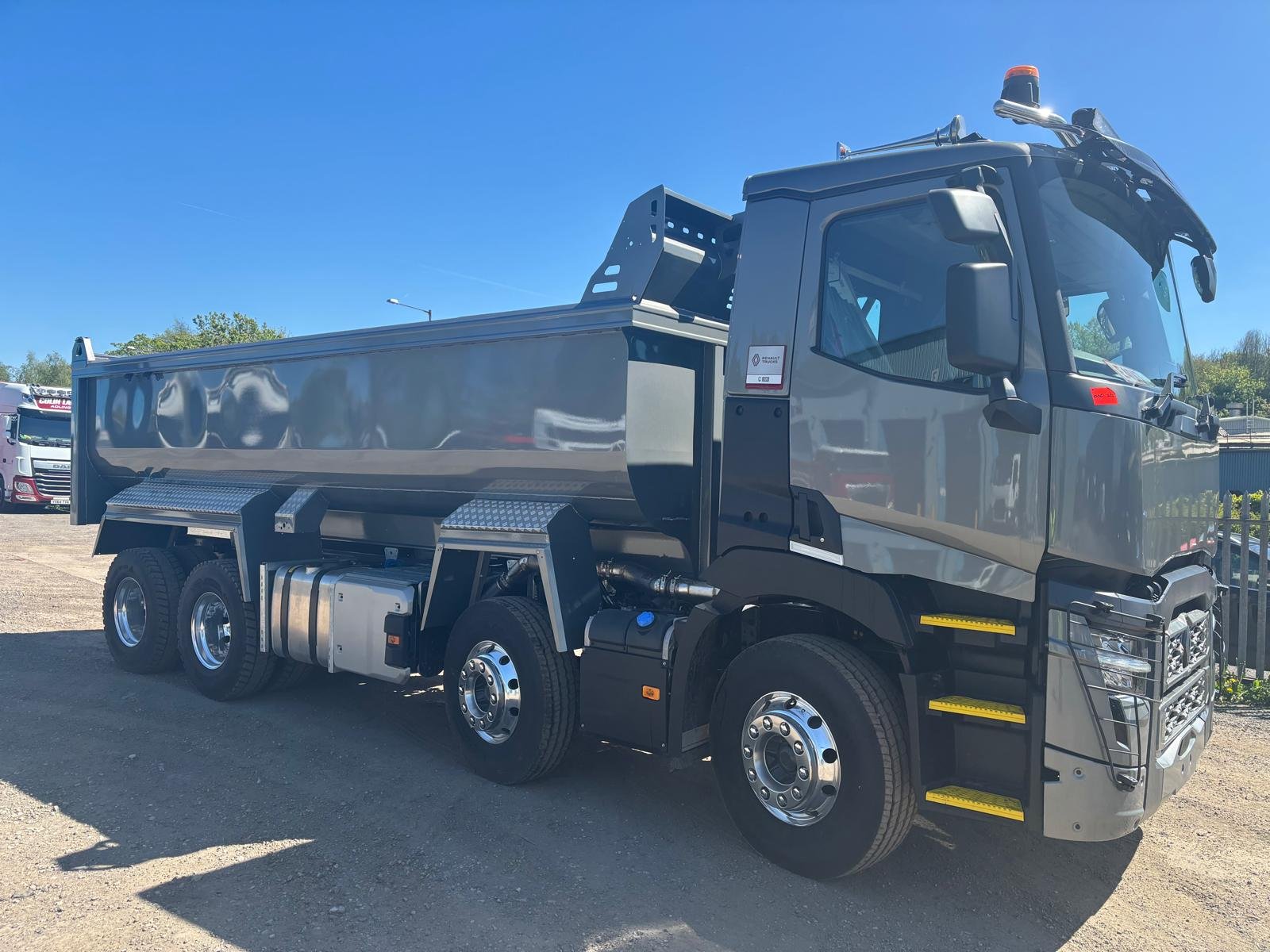 Dark-grey commercial tipper after repainting