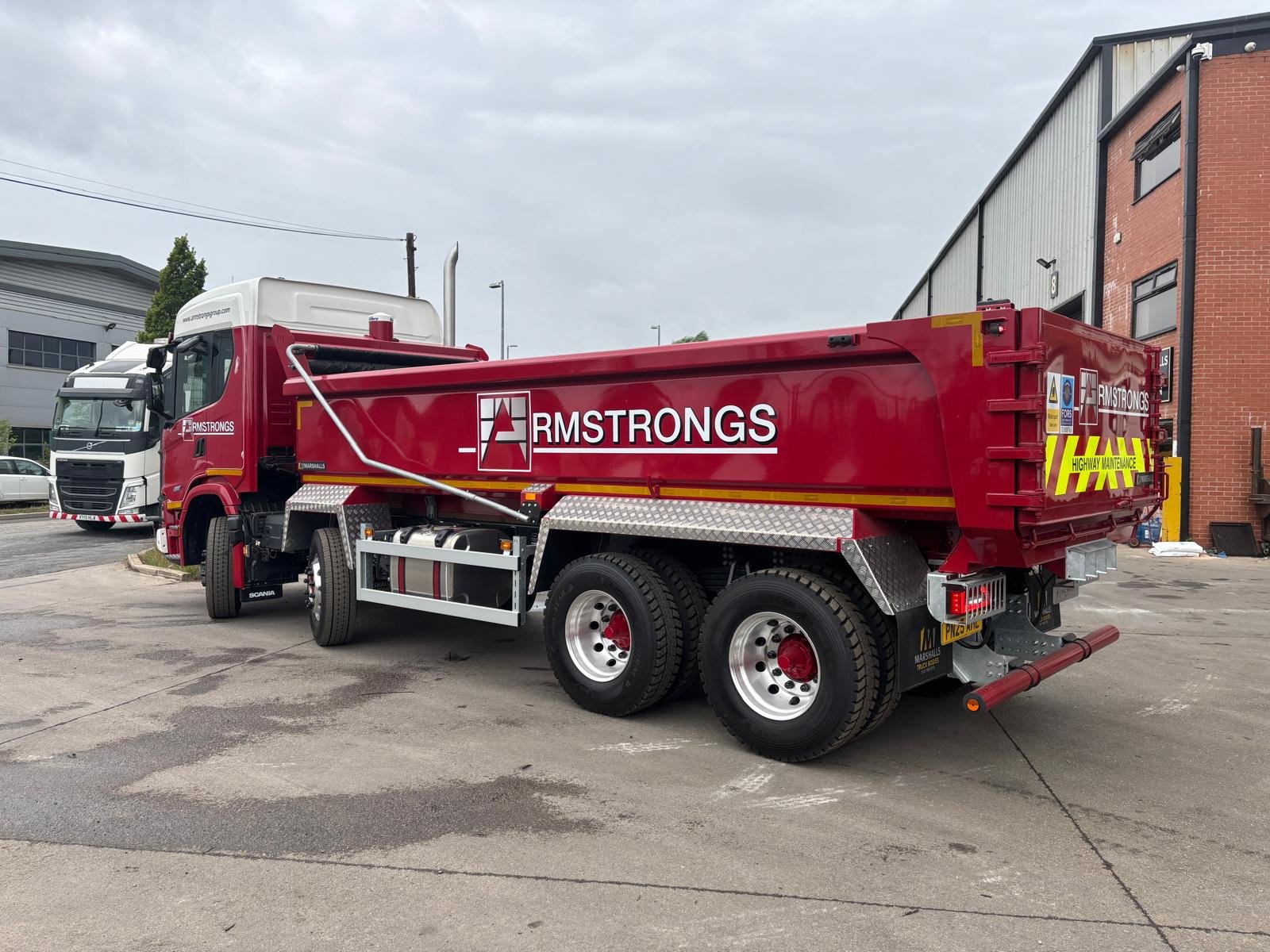 Armstrongs red tipper truck after commercial repainting